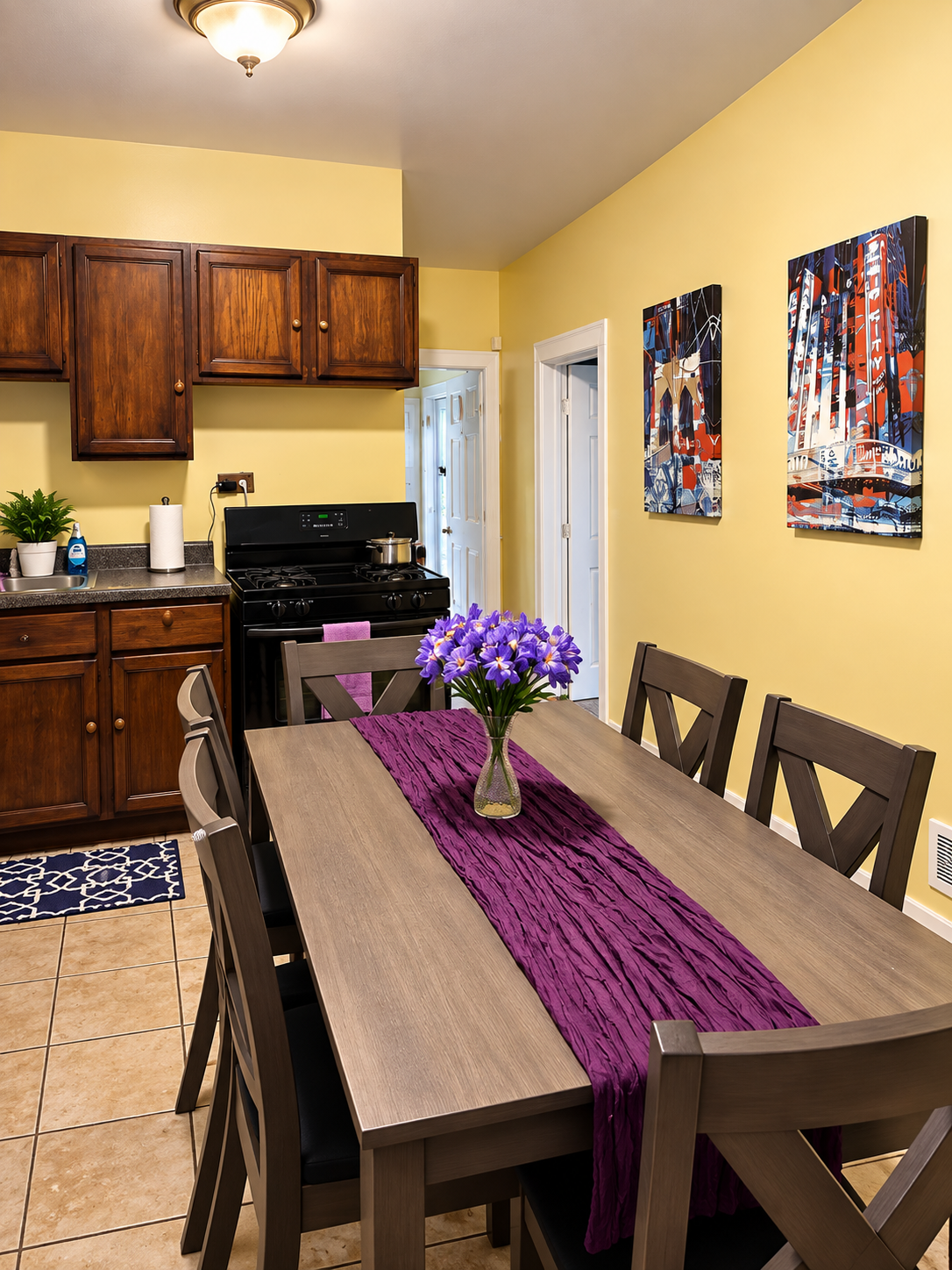 Bright kitchen and dining area with cheerful yellow walls